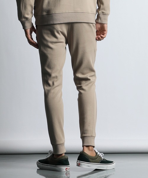 The DUFFER of ST.GEORGE(ザダファーオブセントジョージ)の「〔BLACK LABEL〕T-400 SMOOTH SIMPLE PANTS:セットアップ シンプル スキニーパンツ(スウェットパンツ・メンズ・チャコールグレー/ブラック/ベージュ・LARGE/MEDIUM/X-LARGE/SMALL)」の11枚目の写真