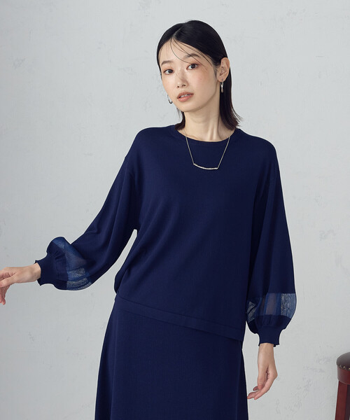 COMME CA ISM(コムサイズム)の「シアー切り替え7分袖ニット / セットアップ対応(ニット/セーター・レディース・ブラック/ネイビー・FREE)」の1枚目の写真