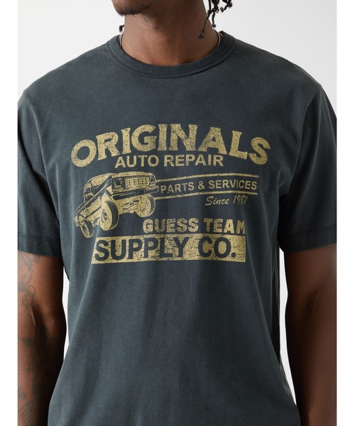 Guess(ゲス)の「GUESS Originals Auto Repair Muscle Tee Tシャツ(Tシャツ/カットソー・メンズ・ホワイト系その他/ブラック・SMALL/X-LARGE/LARGE/MEDIUM)」の14枚目の写真