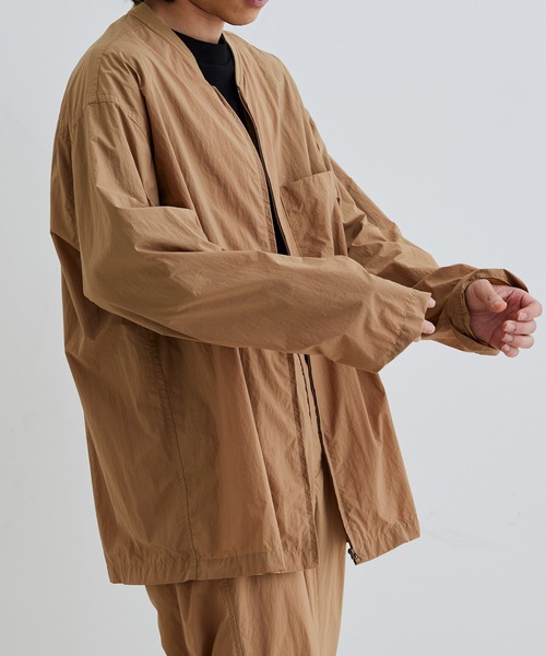 ADAM ET ROPE'(アダムエロペ)の「【小松マテーレ】ナイロン タスラン オーバー シャツ ブルゾン(MA-1・メンズ・スミクロ/ベージュ系その他/ターコイズブルー・L/M)」の15枚目の写真