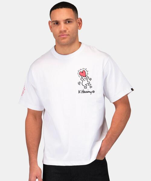 Alpha Industries（アルファインダストリーズ）の「Alpha Industries/アルファインダストリーズ/Keith Haring X Alpha GRAPHIC TEE HEART MAN/キースへリング グラフィック ティーシャツ ハートマン（Tシャツ/カットソー・メンズ・ホワイト/イエロー・X-LARGE/LARGE/MEDIUM/SMALL/X-SMALL）」の7枚目の写真