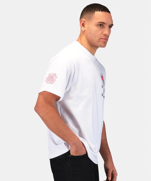 Alpha Industries（アルファインダストリーズ）の「Alpha Industries/アルファインダストリーズ/Keith Haring X Alpha GRAPHIC TEE HEART MAN/キースへリング グラフィック ティーシャツ ハートマン（Tシャツ/カットソー・メンズ・ホワイト/イエロー・X-LARGE/LARGE/MEDIUM/SMALL/X-SMALL）」の9枚目の写真