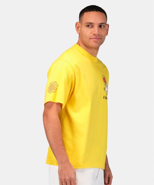 Alpha Industries（アルファインダストリーズ）の「Alpha Industries/アルファインダストリーズ/Keith Haring X Alpha GRAPHIC TEE HEART MAN/キースへリング グラフィック ティーシャツ ハートマン（Tシャツ/カットソー・メンズ・ホワイト/イエロー・X-LARGE/LARGE/MEDIUM/SMALL/X-SMALL）」の16枚目の写真