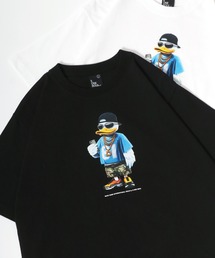 Duck Dude（ダックデュード）の「DUCK DUDE/ダックデュード イラストフラワー フロント バックプリント半袖Tシャツ レディース メンズ（Tシャツ/カットソー）」