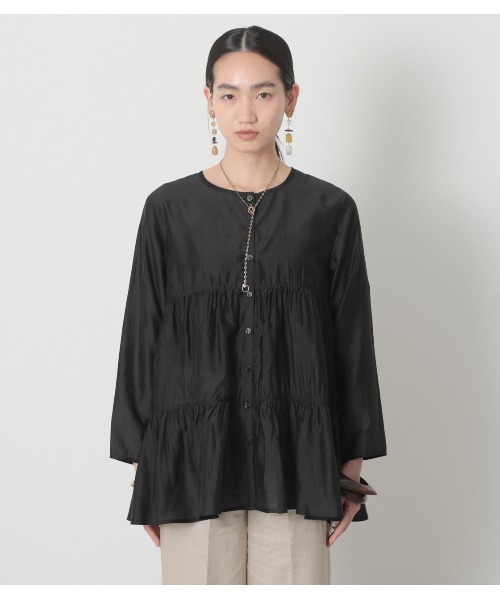 未使用！CHONO アイボリー切り替えティアードブラウス　フリーサイズ crie conforto（クリーコンフォルト）の「シアーティアードブラウス