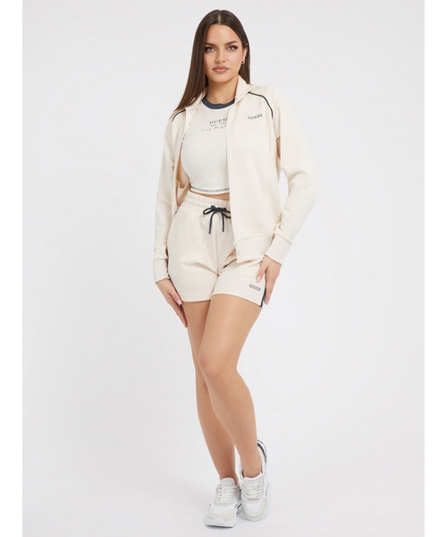 Guess（ゲス）の「Signature Crop Tee（Tシャツ/カットソー・レディース・ブルーグリーン/クリーム/ダークブルー/ピンク・X-SMALL/SMALL/MEDIUM/LARGE）」の11枚目の写真