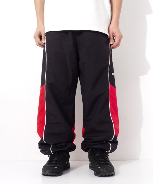 QT8 GARMENTS(キューティーエイトガーメント)の「LB Track Pants (Black/Red)(スウェットパンツ・レディース・その他・MEDIUM/LARGE/X-LARGE)」の1枚目の写真