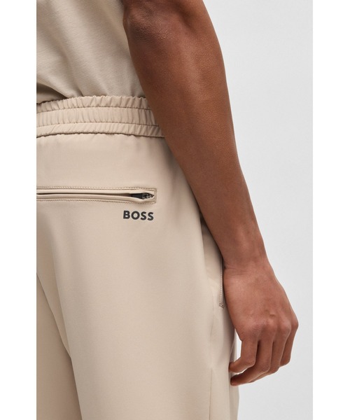 BOSS(ボス)の「テーパードフィットパンツ はっ水ストレッチファブリック(スウェットパンツ・メンズ・ダークブルー/ベージュ/ブラック・52/48/46/50/44/56/54)」の9枚目の写真