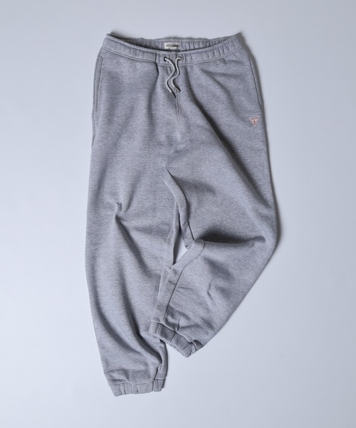 GUESS JEANS(ゲスジーンズ)の「GUESS JEANS GJ TRIANGLE LABEL JOGGER PANTS ゲス スウェット ジョガーパンツ コットン(スウェットパンツ・レディース・ネイビー/グレー・S/L/M)」の1枚目の写真