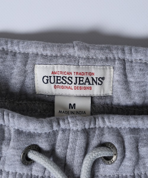 GUESS JEANS(ゲスジーンズ)の「GUESS JEANS GJ TRIANGLE LABEL JOGGER PANTS ゲス スウェット ジョガーパンツ コットン(スウェットパンツ・レディース・ネイビー/グレー・S/L/M)」の12枚目の写真