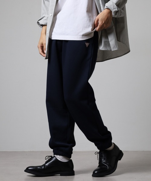 GUESS JEANS(ゲスジーンズ)の「GUESS JEANS GJ TRIANGLE LABEL JOGGER PANTS ゲス スウェット ジョガーパンツ コットン(スウェットパンツ・レディース・ネイビー/グレー・S/L/M)」の15枚目の写真