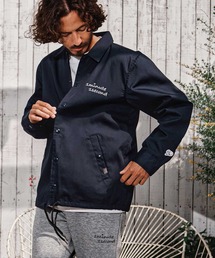 1minute 1second（ワンミニットワンセカンド）の「mj11691-cursive embroidery coach jacket コーチジャケット(1M26A170)（その他アウター）」
