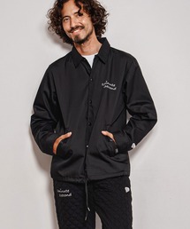 1minute 1second（ワンミニットワンセカンド）の「mj11691-cursive embroidery coach jacket コーチジャケット(1M26A170)（その他アウター）」