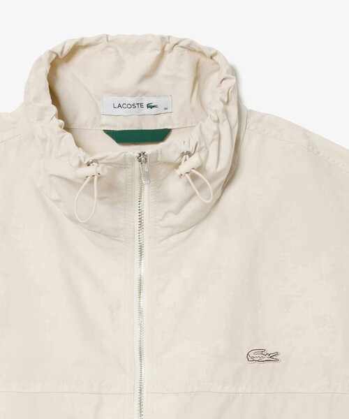 LACOSTE(ラコステ)の「撥水 ショート&ワイドシルエット スタンドカラーナイロンブルゾン(ナイロンジャケット・レディース・ライトグレー/オフホワイト・40/38/36/34)」の19枚目の写真