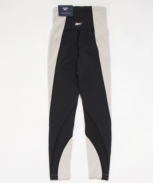 Reebok（リーボック）の「Lux ハイライズ カラーブロック レギンス / Lux High-Rise Colorblock Leggings（レギンス/スパッツ・レディース・ブラック系その他/ネイビー/ブラック×イエロー・LARGE/MEDIUM/X-LARGE/SMALL/X-SMALL/XX-LARGE）」の4枚目の写真