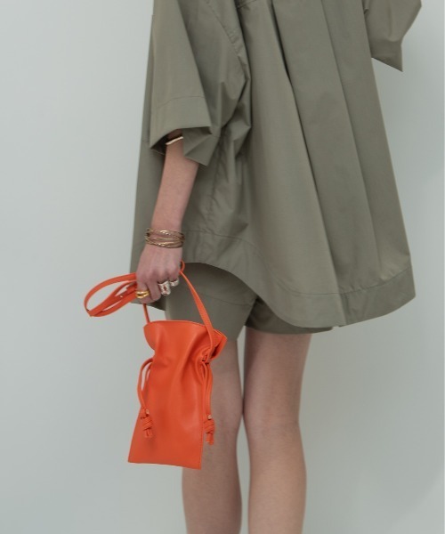 HANNE（アン）の「ミニ巾着フェイクレザーショルダーバッグ（ショルダーバッグ・レディース・ホワイト/ブラック/オレンジ・フリー）」の11枚目の写真