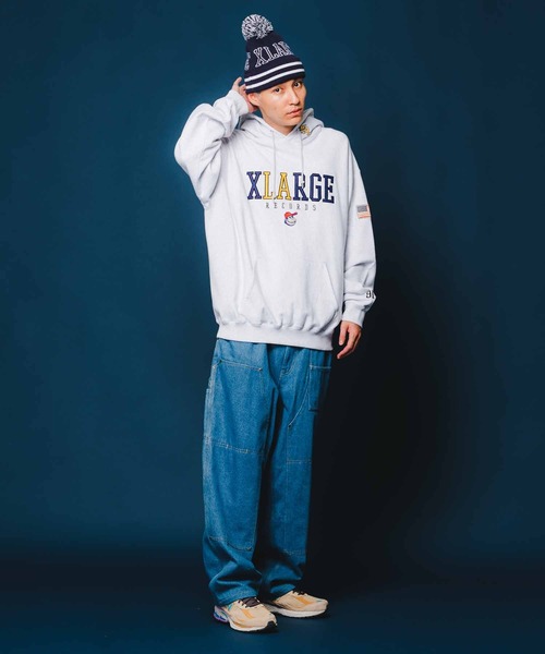 XLARGE（エクストララージ）の「XL LABEL SOUVENIR HOODED SWEAT