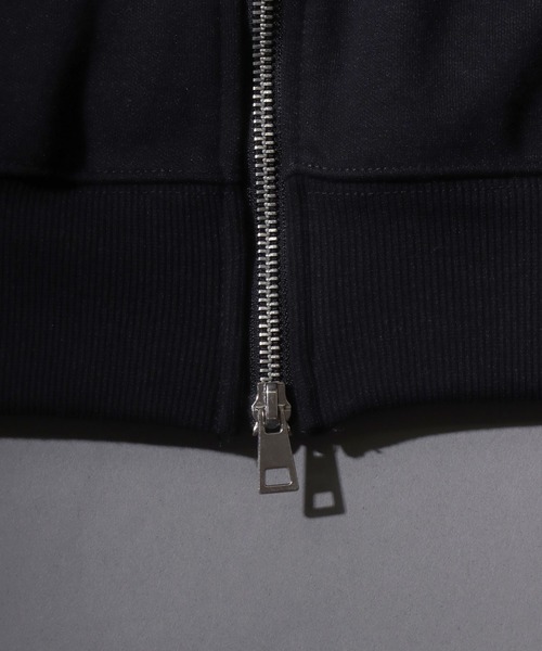 SITRY（シトリー）の「Cross ＆ Trival Logo Rinestone Sweat Zip Hoodie/クロスロゴ トライバルロゴ ラインストーン オーバーサイズ ショート丈 ダブルジップ ポンチ フルジップパーカー フーディー パーカー スウェット レディース メンズ（パーカー・メンズ・ホワイト/ブラック・M/L）」の22枚目の写真
