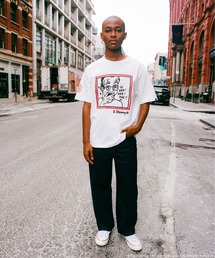 Alpha Industries(�A���t�@�C���_�X�g���[�Y)��Alpha Industries/�A���t�@�C���_�X�g���[�Y/Keith Haring X Alpha GRAPHIC TEE HEE HEE/�L�[�X �փ����O �O���t�B�b�N �e�B�[�V���c �ւ�(T�V���c/�J�b�g�\�[)