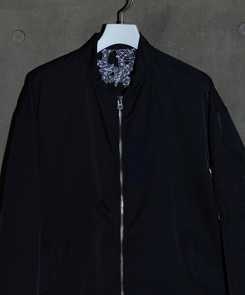 NUMBER (N)INE（ナンバーナイン）の「【NUMBER (N)INE】≪STUDIOUS限定≫別注ハイカウントツイルビッグシルエットMA-1（MA-1・メンズ・ネイビー/キャメル/パープル・2/3/1）」の4枚目の写真