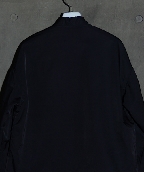 NUMBER (N)INE（ナンバーナイン）の「【NUMBER (N)INE】≪STUDIOUS限定≫別注ハイカウントツイルビッグシルエットMA-1（MA-1・メンズ・ネイビー/キャメル/パープル・2/3/1）」の9枚目の写真