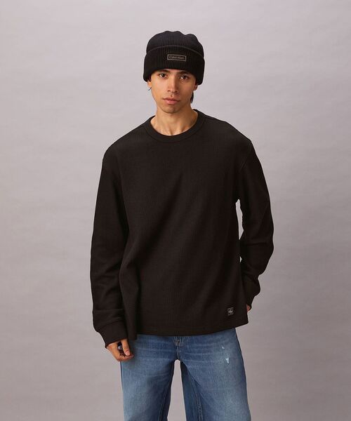 Calvin Klein(カルバン・クライン)の「【ユニセックス】長袖Tシャツ - ロゴパッチロングスリーブワッフルTシャツ(Tシャツ/カットソー・メンズ・ブラック/グレー/ベージュ・L/XL/M/S)」の1枚目の写真