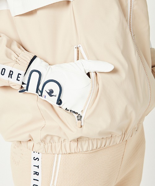 le coq sportif GOLF（ルコックスポルティフゴルフ）の「ウインドブレーカー 撥水 ストレッチ 防風 ジャケット ブルゾン ゴルフウエア レディス トレーニングウエア スポーツ（ブルゾン・レディース・グレイッシュベージュ/ネイビー・L/M(M)/S）」の21枚目の写真