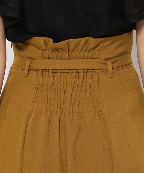 mysty woman(ミスティウーマン)の「ベルテッドハイウエストナロースカート 964545(スカート・レディース・アイボリー/マスタード/モカ・SMALL/MEDIUM)」の22枚目の写真