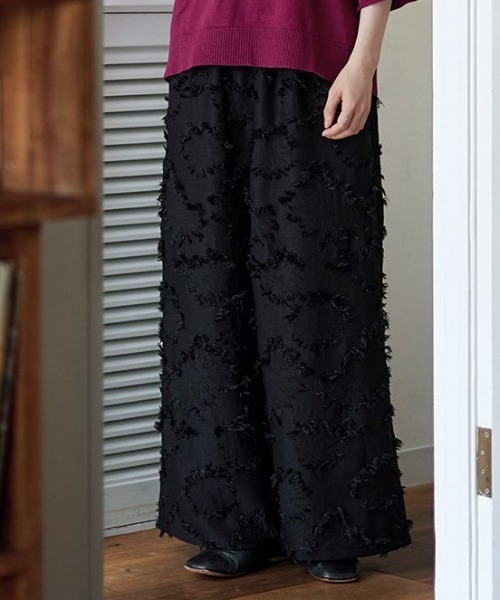 Sunny clouds(サニークラウズ)の「サニークラウズ フリンジだらけパンツ〈レディース〉(その他パンツ・レディース・ブラック・MP/M/L/LL)」の1枚目の写真