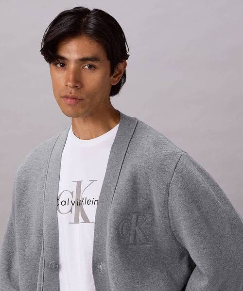 Calvin Klein(カルバン・クライン)の「ニット - バーシティカーディガンセーター(カーディガン/ボレロ・メンズ・グレー/ブラック・L/S/M)」の12枚目の写真