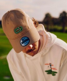 LACOSTE（ラコステ）の「ラコステ×ニューエラ 9TWENTY ゴルフ&ワニロゴワッペンキャップ（キャップ）」