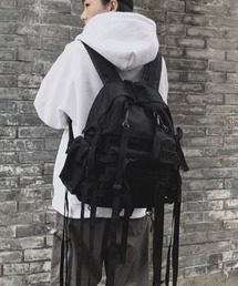 ARULE（アリュール）の「A'GEM/9 × .kom『ARULE/アルール』マルチポケット ベルト付 バックパック（バックパック/リュック）」