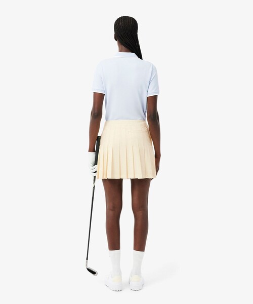 LACOSTE（ラコステ）の「ハイストレッチ ウルトラドライゴルフプリーツスカート インナー付き（スカート・レディース・ホワイト/ネイビー・38/36/34）」の21枚目の写真