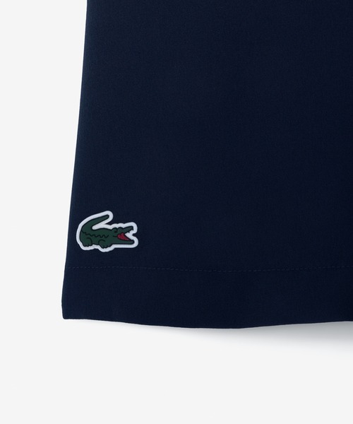 LACOSTE（ラコステ）の「ハイストレッチ ウルトラドライゴルフプリーツスカート インナー付き（スカート・レディース・ホワイト/ネイビー・38/36/34）」の7枚目の写真