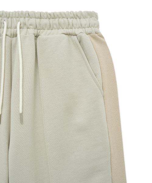 WEST GRAND BOULEVARD(ウエストグランドブルバード)の「ロードサイドヘビーウェイトスウェットピンタックトラックパンツWARM BEIGE(スウェットパンツ・メンズ・その他・SMALL/MEDIUM/LARGE)」の5枚目の写真