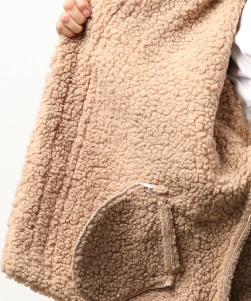 BLUEEAST(ブルーイースト)の「フェイクムートンボアブルゾン フライトジャケット/B-3 ムスタン(ムートンコート・レディース・ベージュ/ブラウン・MEDIUM)」の6枚目の写真
