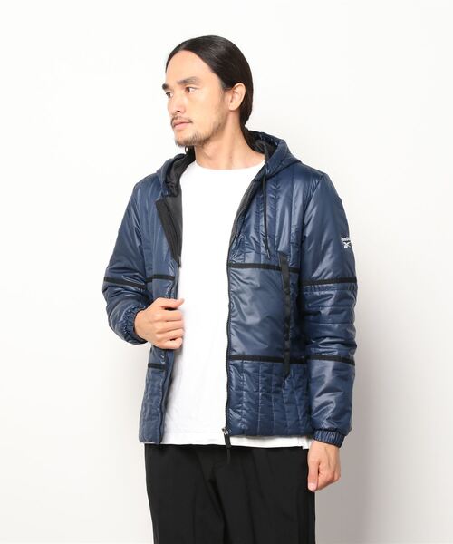 Reebok(リーボック)の「アウターウェア コア パッディド ジャケット / Outerwear Core Padded Jacket(ダウンジャケット/コート・メンズ・ブラック/ネイビー・MEDIUM/XX-LARGE/LARGE/XXX-LARGE/X-LARGE/SMALL)」の4枚目の写真