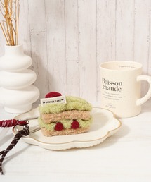 crossi（クロッシー）の「ケーキモチーフもこもこボアチャーム（チャーム・レディース）」