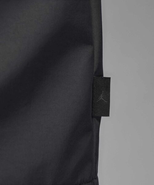 JORDAN BRAND(ジョーダンブランド)の「エア ジョーダン メンズ トラックジャケット / Air Jordan Men's Track Jacket HV0081-045 Off Noir(ナイロンジャケット・メンズ・ブラック系その他・XL/2XL/S/L/M)」の3枚目の写真