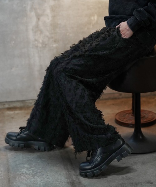 G.O.C(ジーオーシー)の「フリンジ ジャガード ワイド パンツ(スラックス・メンズ・ブラック・MEDIUM/LARGE)」の2枚目の写真