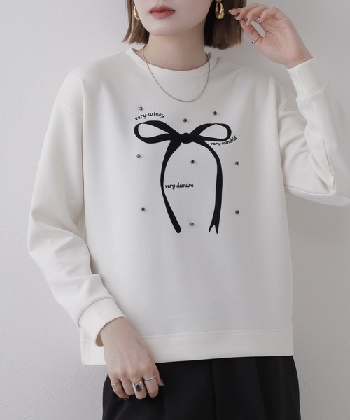 Miunelora(ミューネローラ)の「Miunelora リボンモチーフダンボールプルオーバー 長袖(Tシャツ/カットソー・レディース・アイボリー/モカ・38)」の1枚目の写真