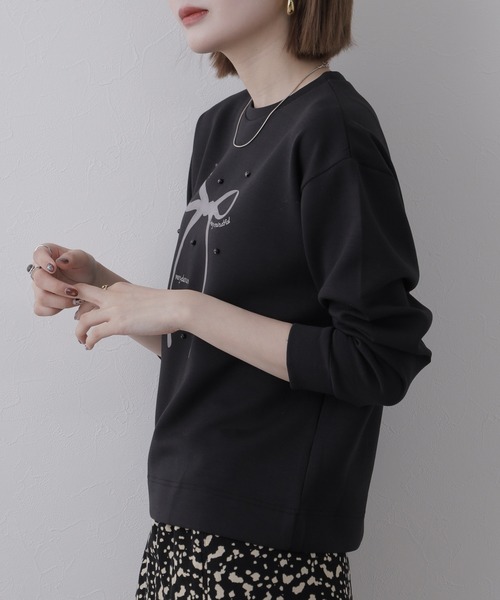 Miunelora(ミューネローラ)の「Miunelora リボンモチーフダンボールプルオーバー 長袖(Tシャツ/カットソー・レディース・アイボリー/モカ・38)」の6枚目の写真