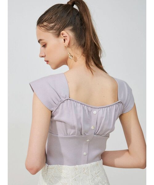 MERCURYDUO(マーキュリーデュオ)の「ビスチェ風フロントボタンニット(ニット/セーター・レディース・オフホワイト/ブラック/ピンク/ラベンダー・FREE)」の4枚目の写真