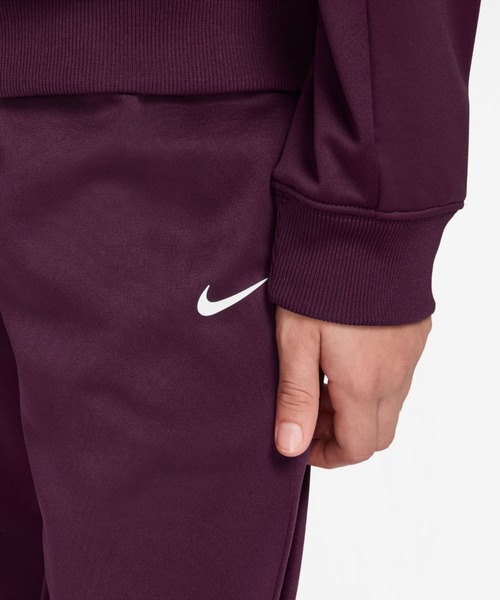 NIKE（ナイキ）の「ナイキ スポーツウェア ジュニア Dri-FIT トラックスーツ / Nike Sportswear Big Kids' Dri-FIT Tracksuit HQ9317-610 Bordeaux（セットアップ・キッズ・パープル・130/140/150/160）」の4枚目の写真