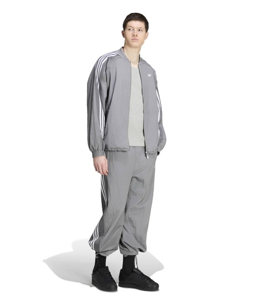 adidas(アディダス)の「adidas ADILENIUM 5.0 TRACK TOP / アディダス アディレニウム シーズン 5 トラックトップ(ナイロンジャケット・メンズ・グレー・S/M/L/XL/XXL)」の2枚目の写真