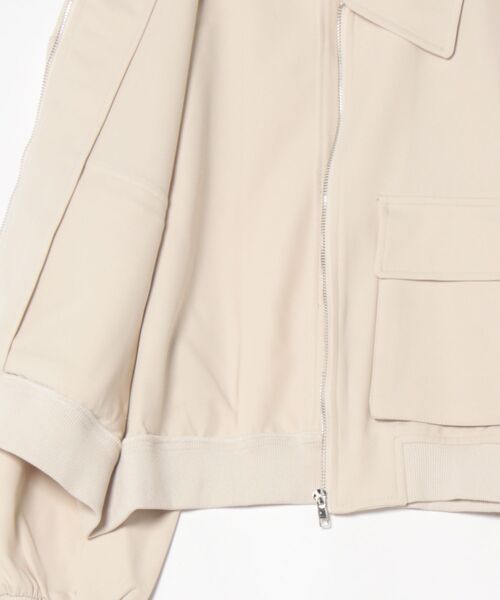 STYLEBLOCK(スタイルブロック)の「ビッグポケットジップブルゾン(MA-1・レディース・ブラック/アイボリー・FREE)」の4枚目の写真