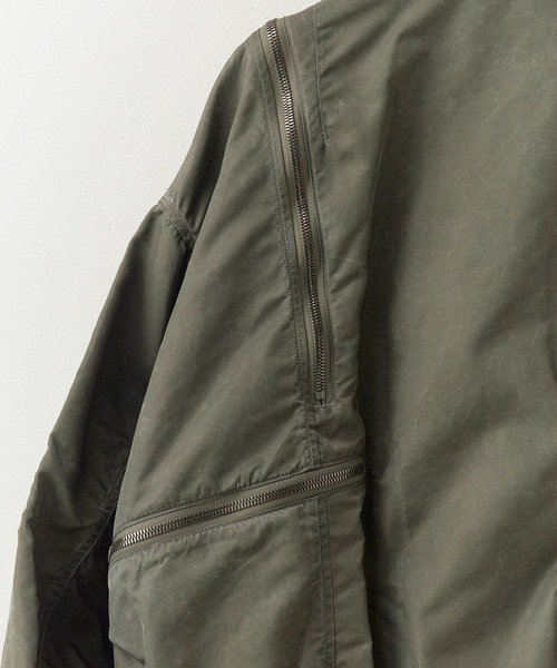 FACETASM(ファセッタズム)の「FACETASM/ファセッタズム ZIPPER BUG MA-1 シガレットポケット ユーズド加工ブルゾン 2026年春夏(MA-1・レディース・カーキ・00)」の7枚目の写真