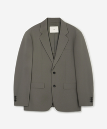 TNGT（ティーエヌジーティー）の「Hard Twist Comfort Jacket (Greyish Khaki) TNJA6E204K2（テーラードジャケット）」