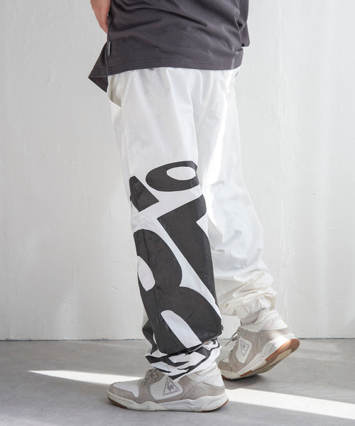 VISION STREET WEAR（ヴィジョンストリートウェア）の「VISION STREET WEAR ヴィジョンストリートウェア サークルロゴナイロンパンツ（その他パンツ・メンズ・ホワイト/ブラック・L/LL/M）」の4枚目の写真