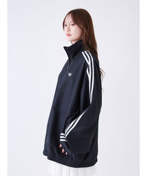 adidas(アディダス)の「【adidas Originals】FIRE BIRD ADILENIUM TT/ファイヤーバードアディレニウムトラックジャケット(ブルゾン・レディース・ブラック・XS)」の8枚目の写真
